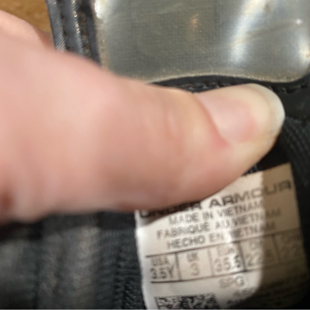 Boys under armour baseball cleats.